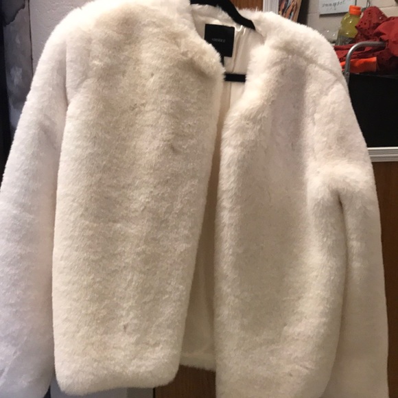 white furry jacket